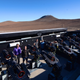 University of Warwick astronomers posing at the Next-Generation Transit Survey (NGTS) in Chile’s Atacama Desert.